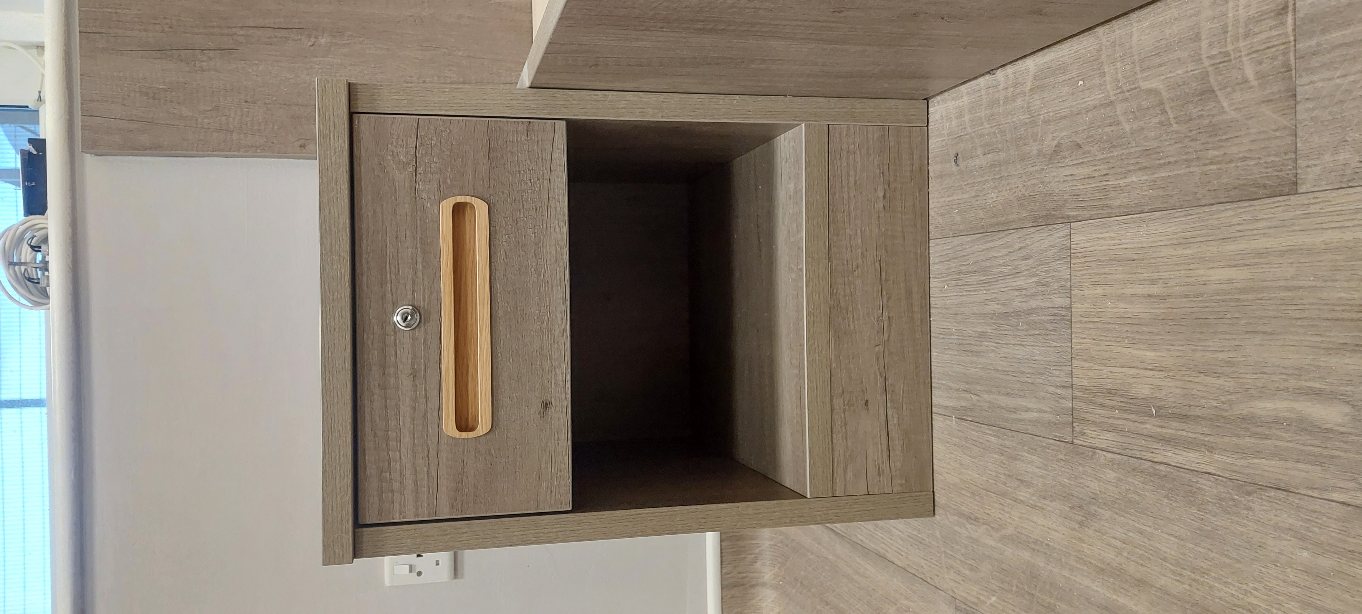 Compact timber storage cabinet
