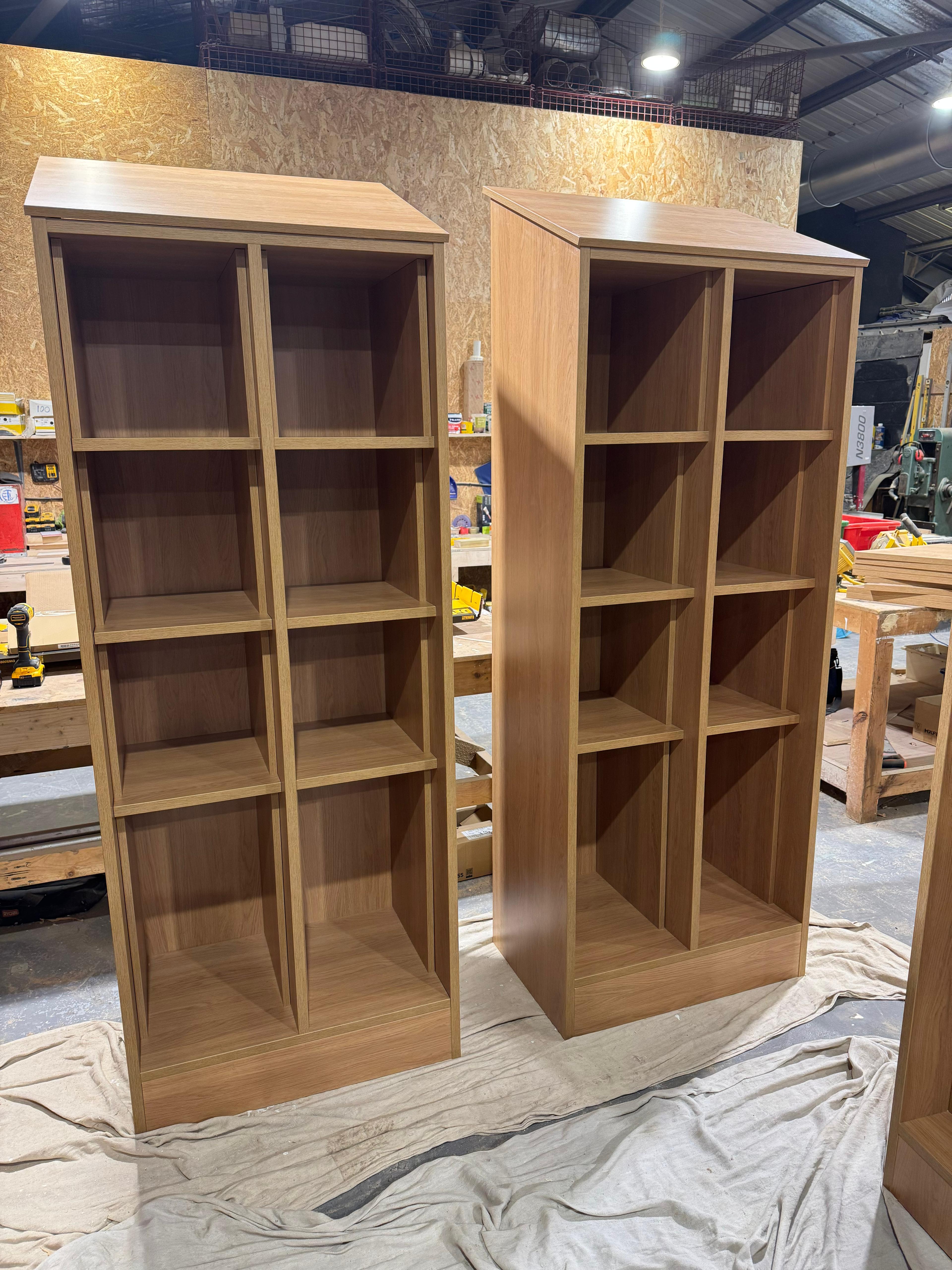 Tall oak shelving units in the workshop