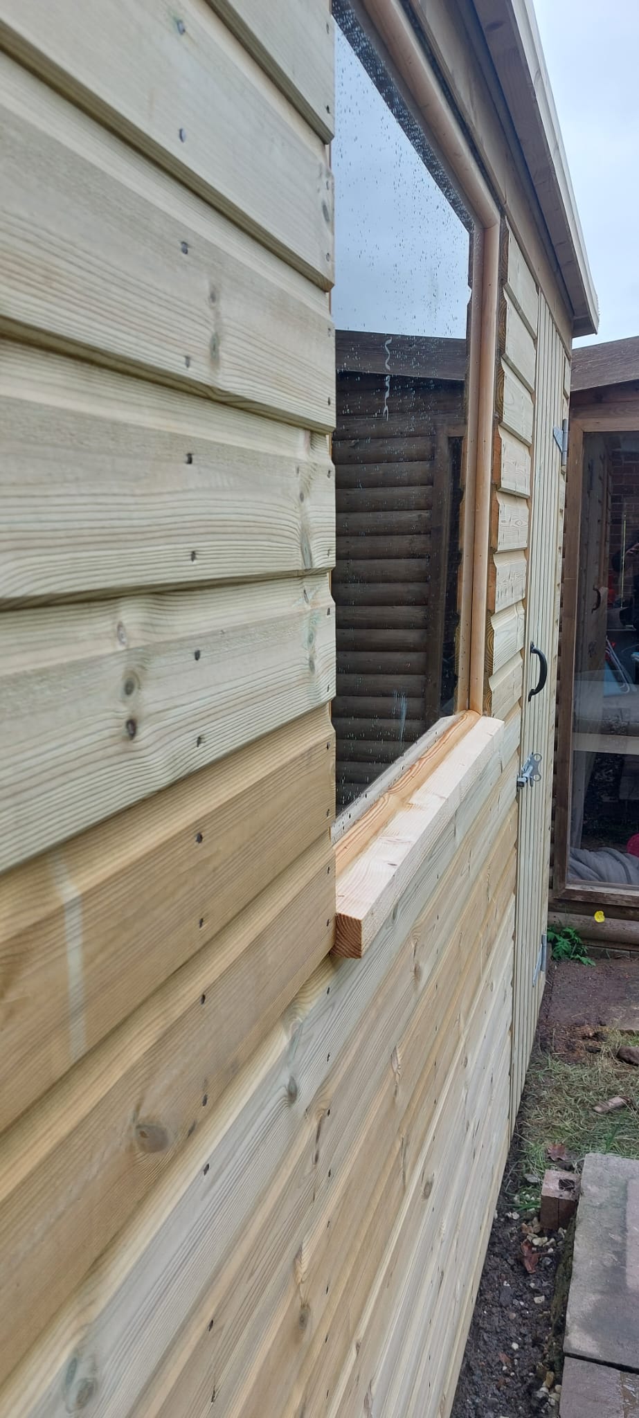 Timber shed wall and window detail